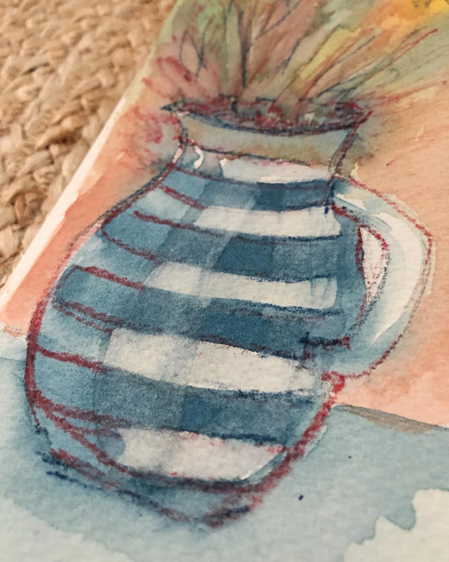 Detailed image of the blue and white Cornish jug with red outline